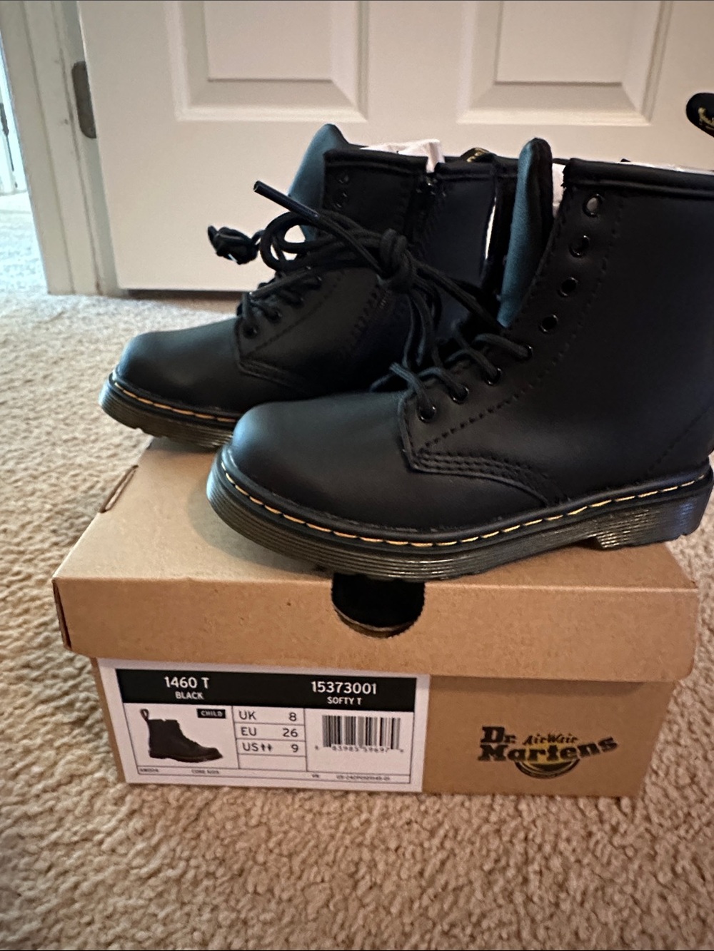 Dr. Martens Black Leather Ankle Boots with Yellow Welt Stitching